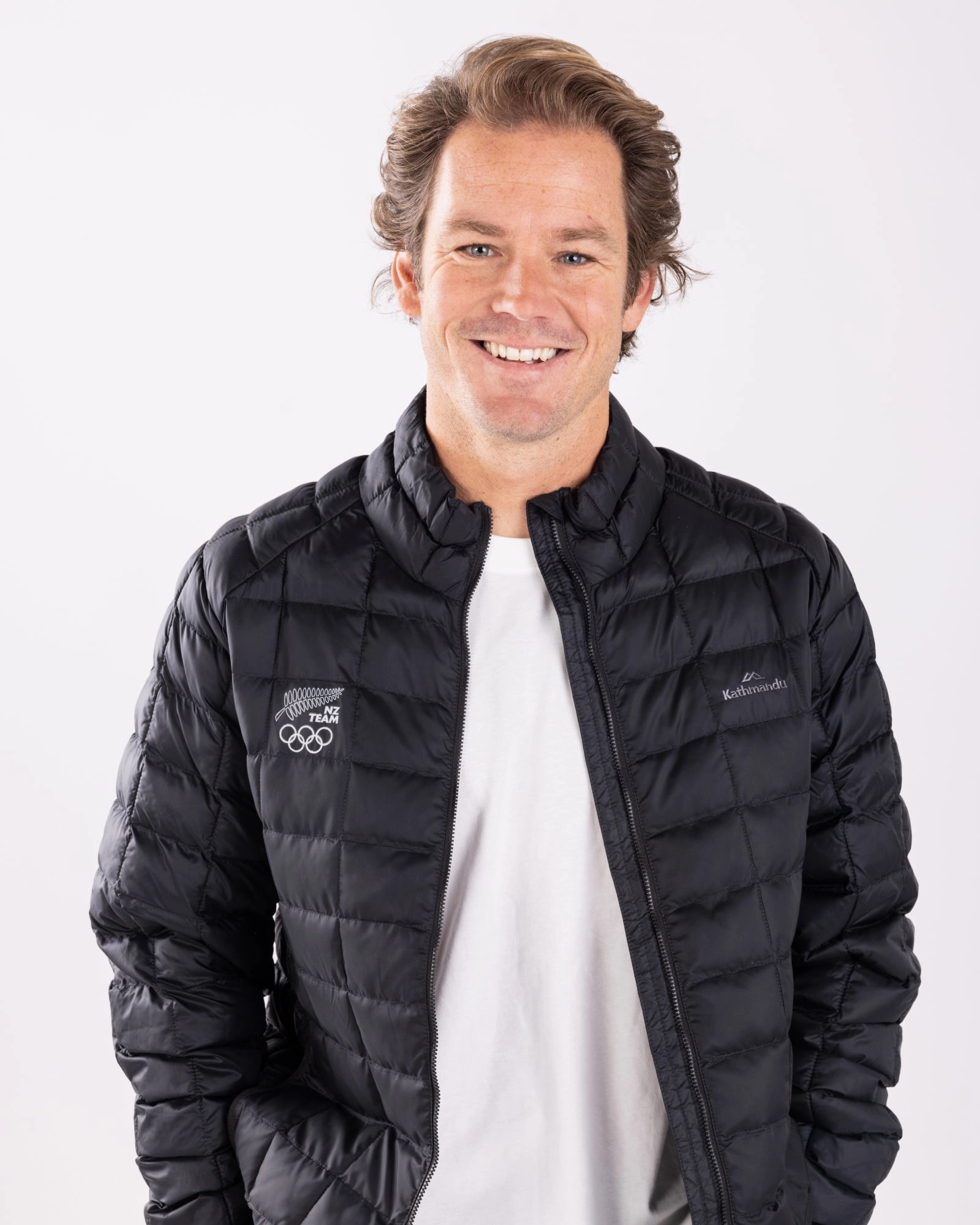 Men's Heli Insulated Jacket - Black | New Zealand Team Supporters Collection High Density Weave Non Bulky Insulation Tech