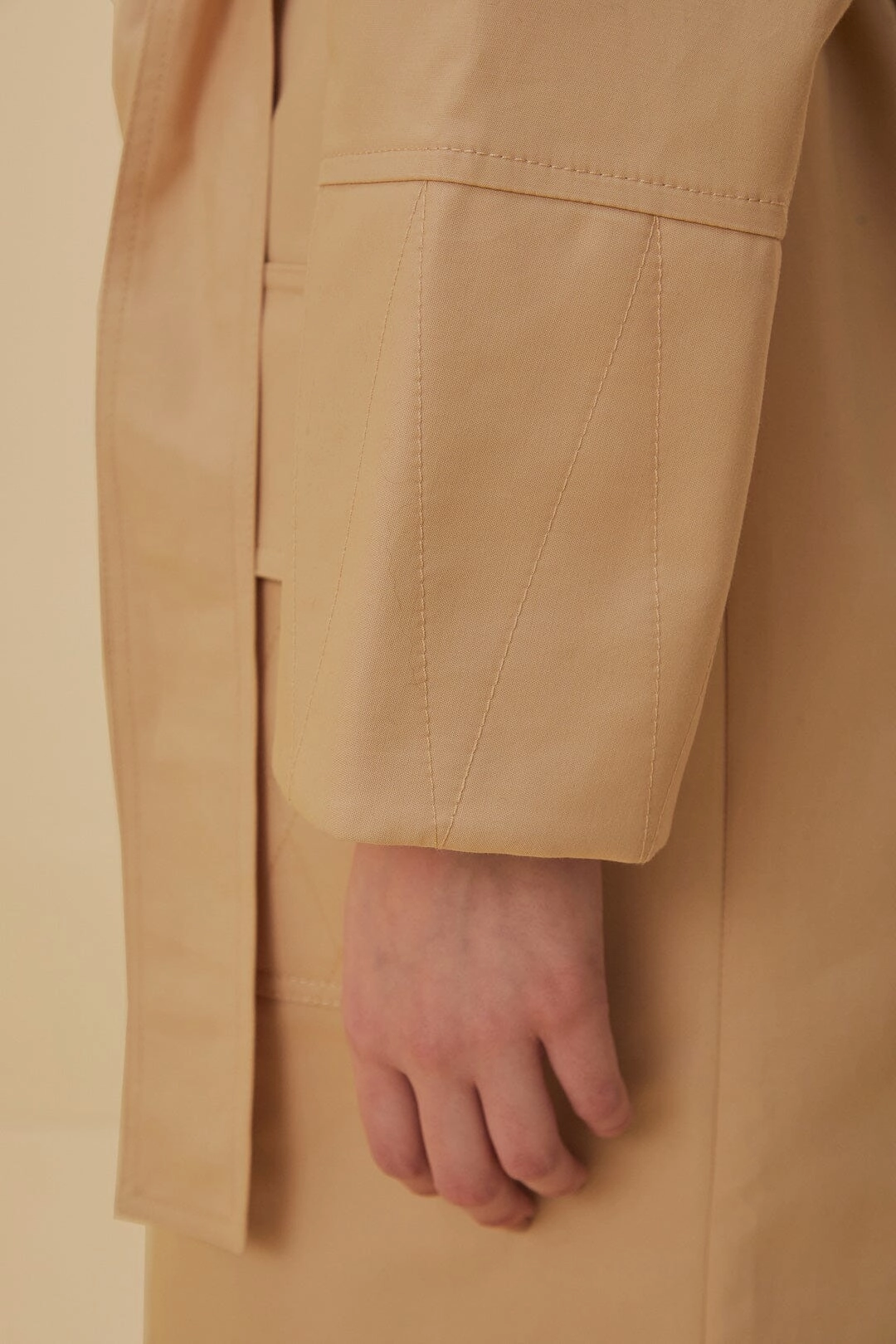Modular Layering System Pockets Over Nude Trench Coat