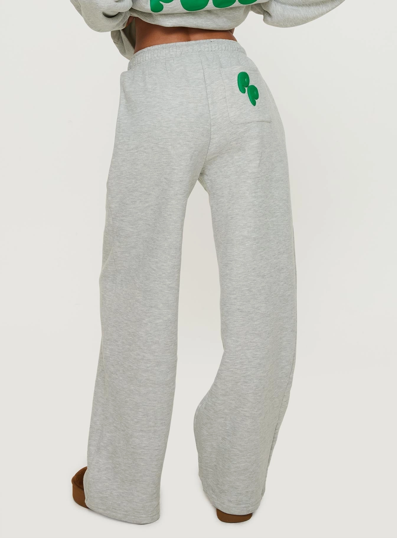 Quick Access clean look Princess Polly Wide Leg Track Pant Bubble Text Grey Marle / Green