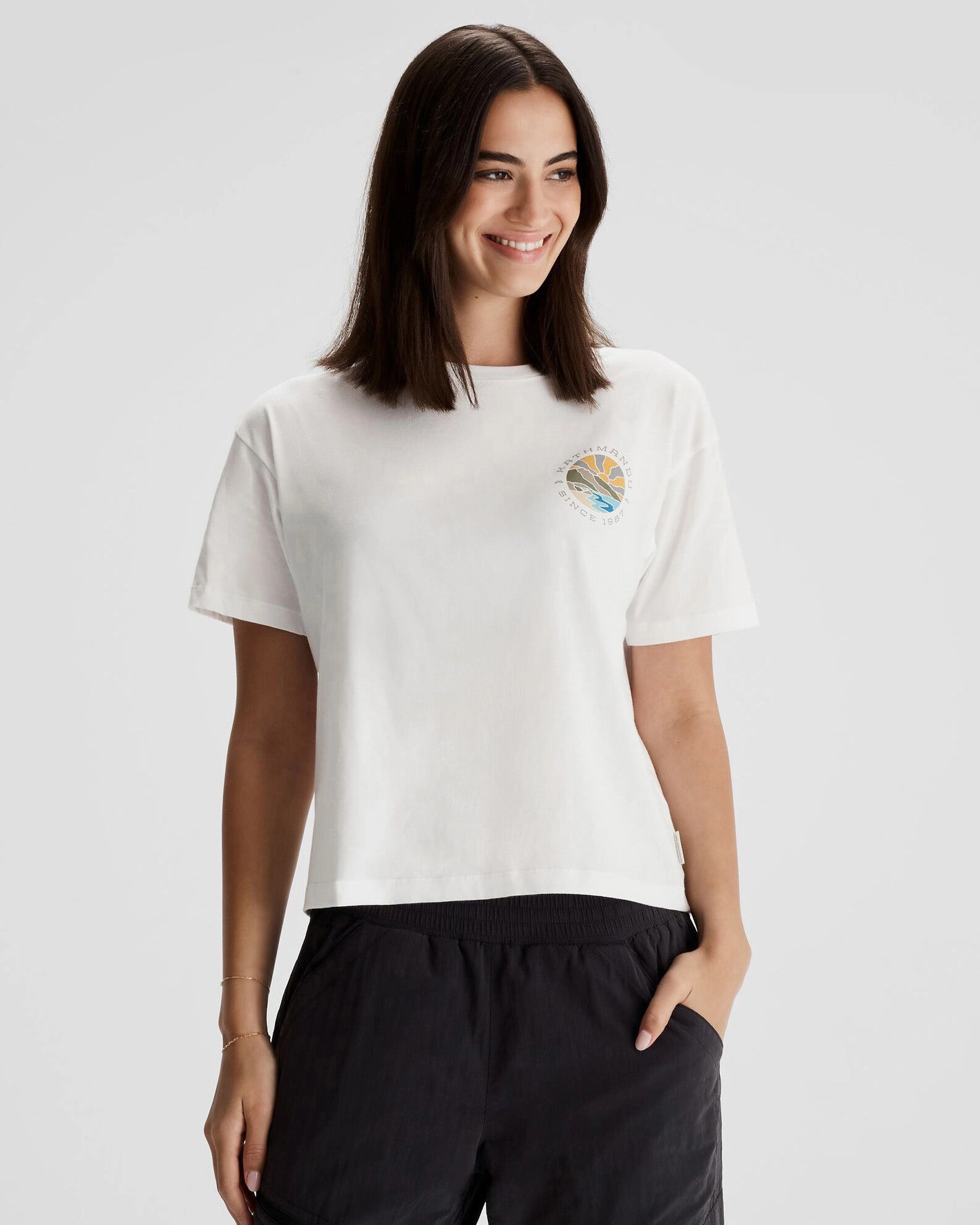 Self Fabric Tape Chic Fashion Women's Kathmandu Logo Sunburst Organic Cotton T-shirt - White